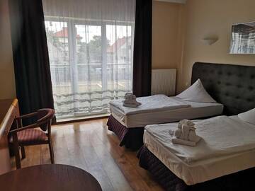 Фото номера Двухместный номер с 2 отдельными кроватями Отель Hotel Relax г. Слубице 18