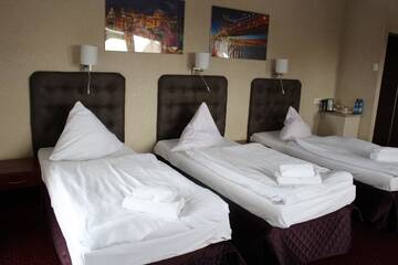 Фото номера Семейный номер (для 3 взрослых) Отель Hotel Relax г. Слубице 3