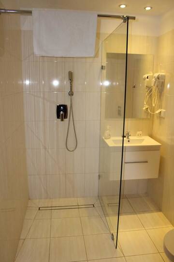 Фото номера Двухместный номер с 2 отдельными кроватями Отель Hotel Relax г. Слубице 12