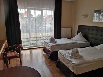 Фото номера Двухместный номер с 2 отдельными кроватями Отель Hotel Relax г. Слубице 2